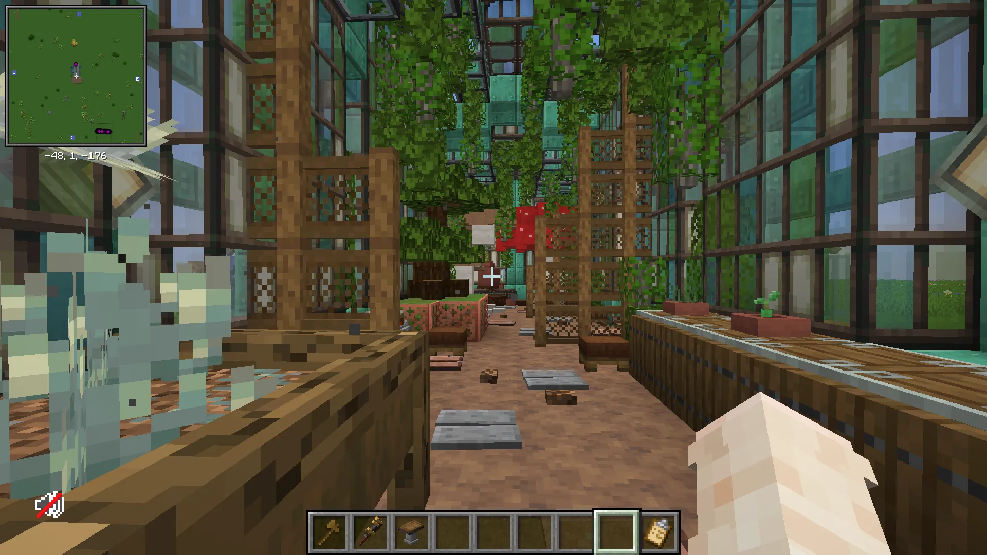Interior view of a detailed copper greenhouse with vines and potted plants
