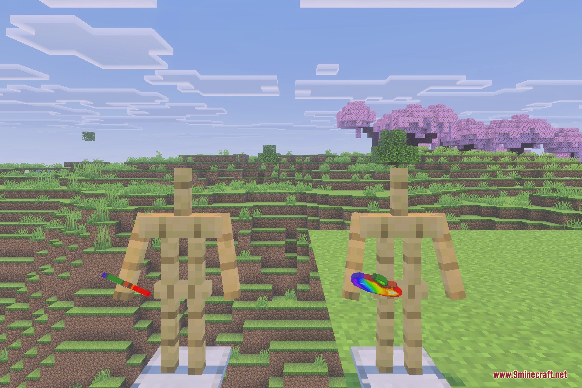 Two armor stands display powerful custom weapons in a cherry blossom biome