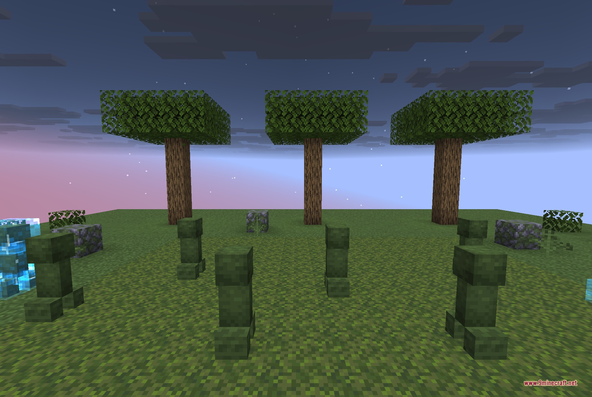 Multiple mossy creepers standing in a grassy field under the night sky