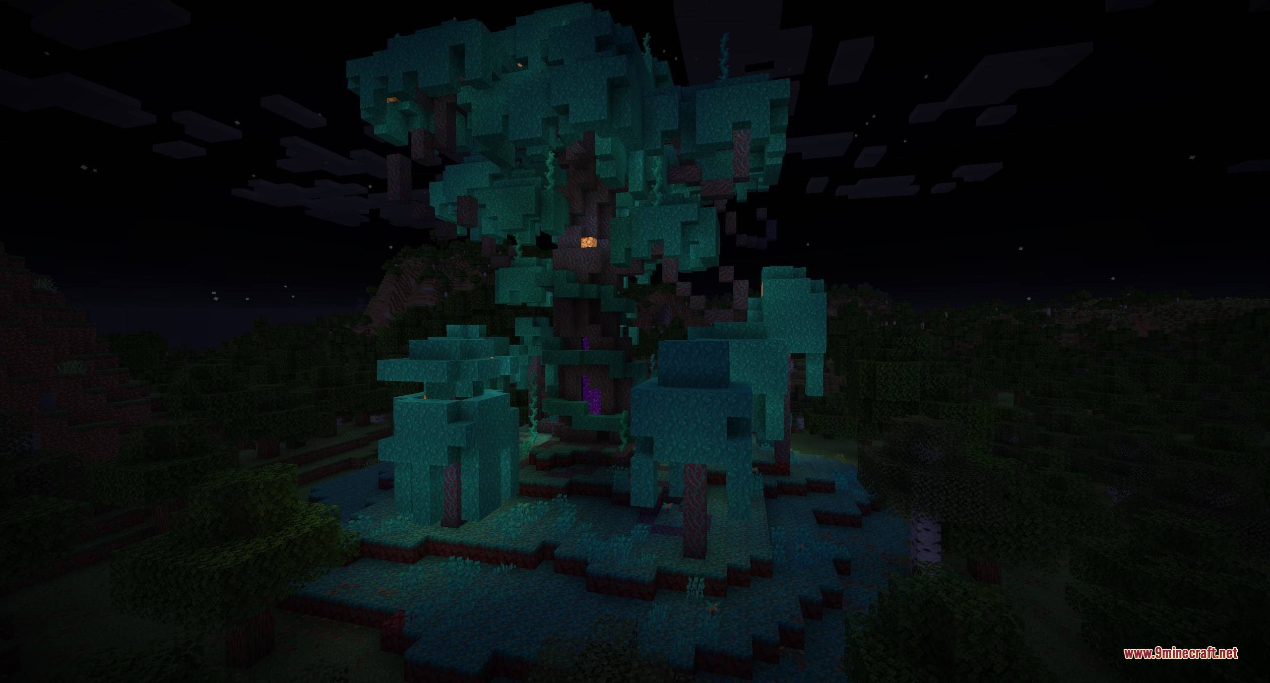 A massive warped forest tree structure with a nether portal at night