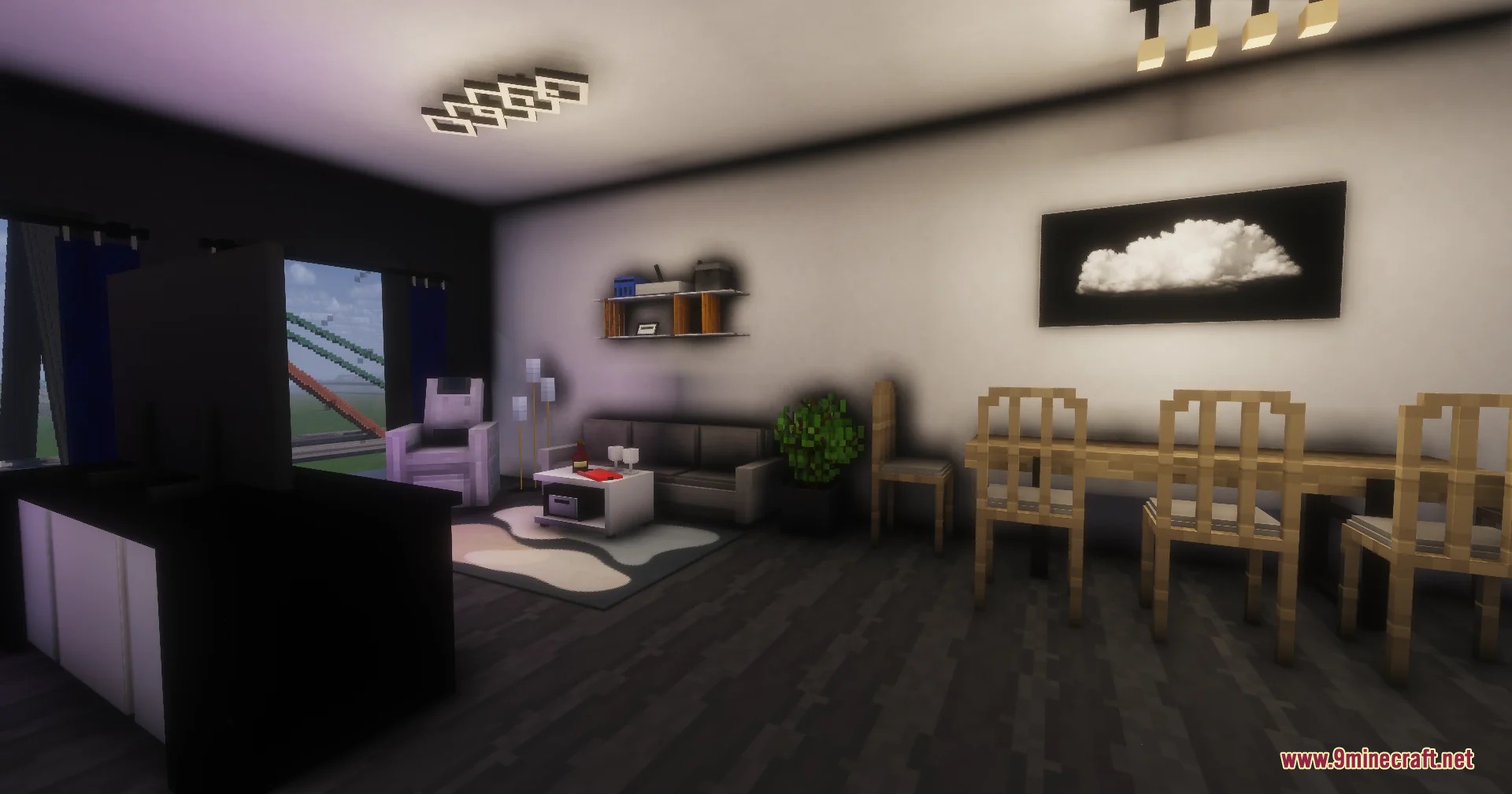 Modern living room featuring a dining table and a sofa with a TV