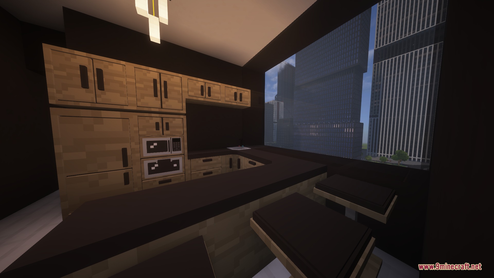 Modern kitchen interior featuring wooden cabinets and a large window overlooking the city