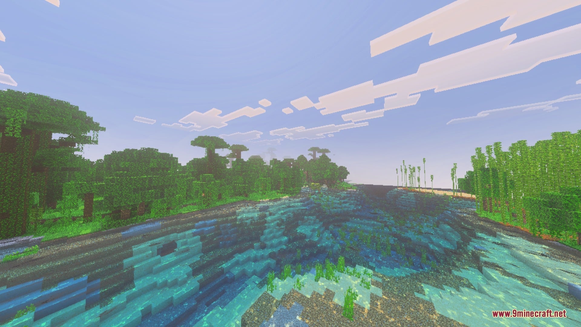 Lush green jungle trees bordering a clear river with soft ambient lighting