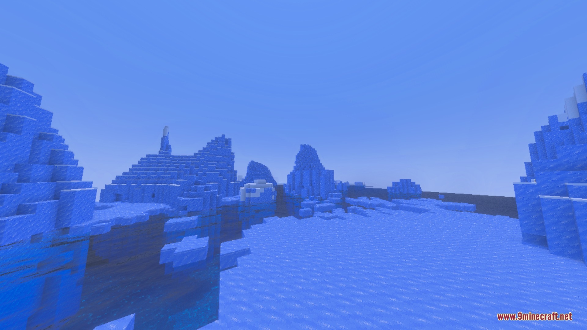 Detailed blue ice spikes stand tall across a frozen ocean landscape