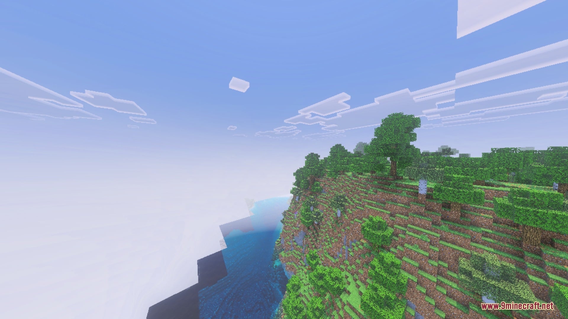 Lush green trees on a cliffside overlooking clear water with realistic lighting