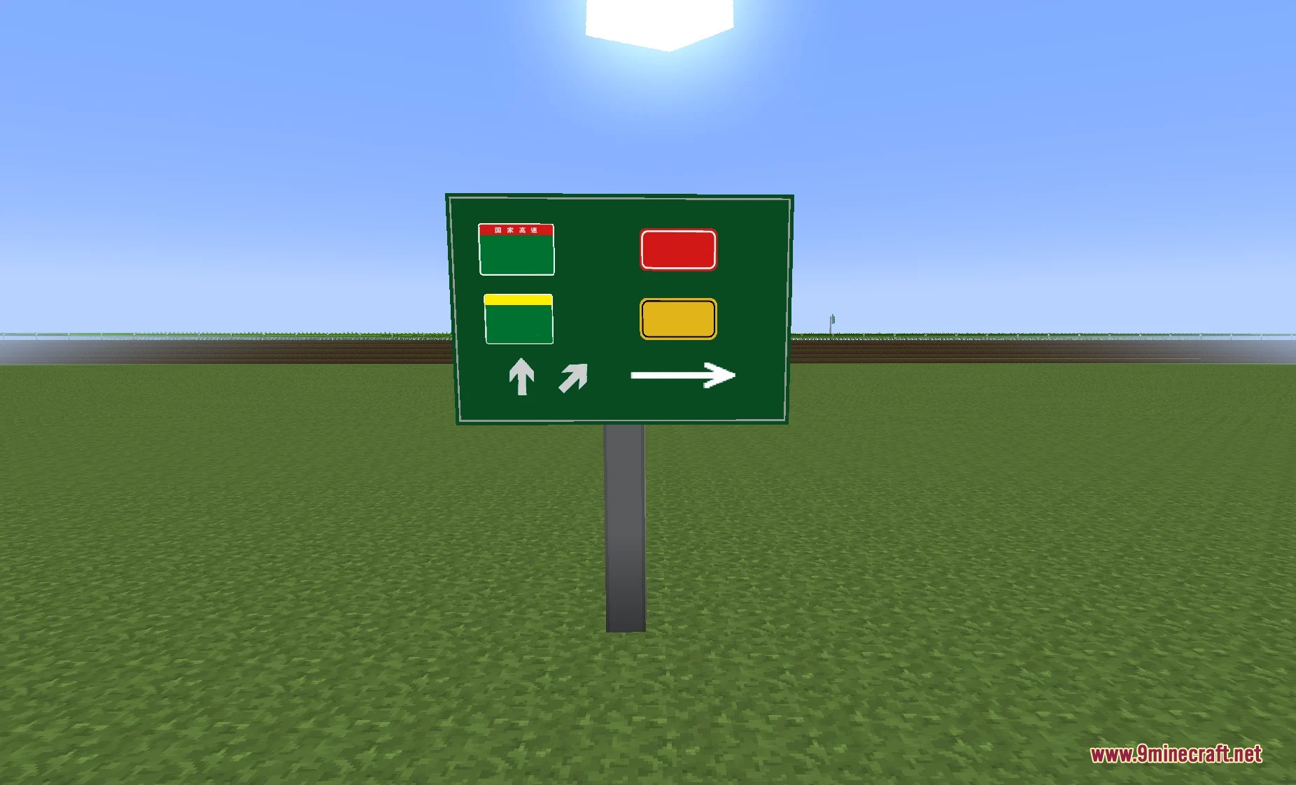 A green highway directional sign standing on a pole in a flat world