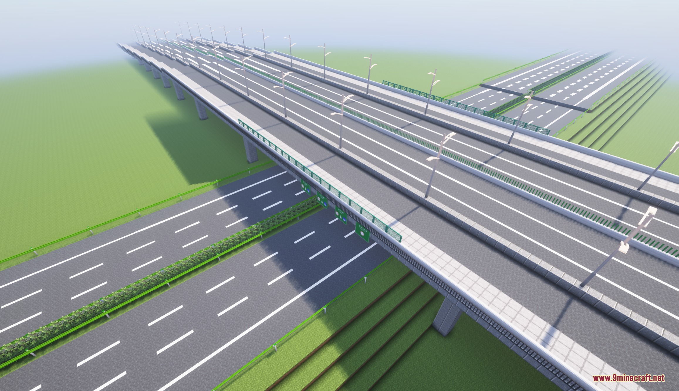 A complex highway interchange with multiple lanes and overpasses in a Minecraft world
