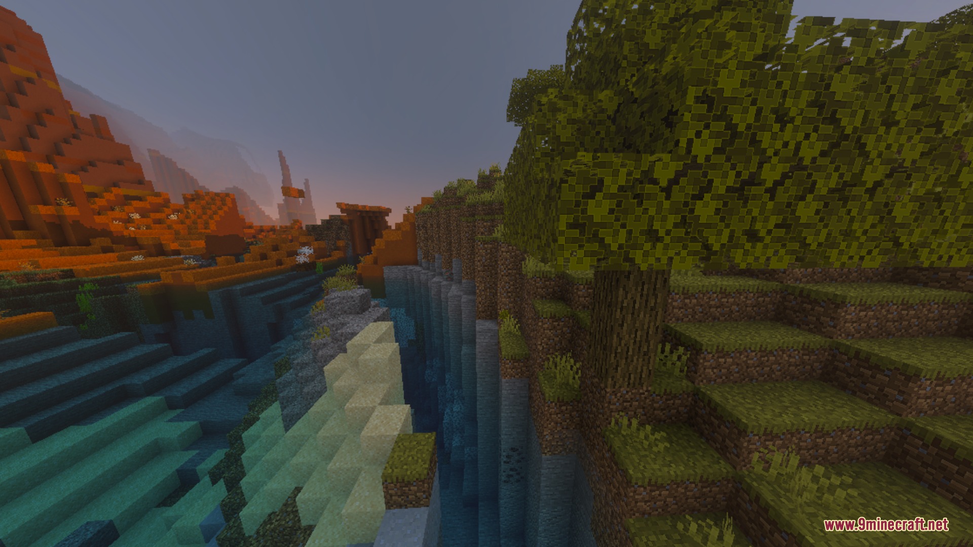 EMERALD VIBRANT Shader Screenshot 3 A deep canyon separates lush green hills from a colorful mesa biome