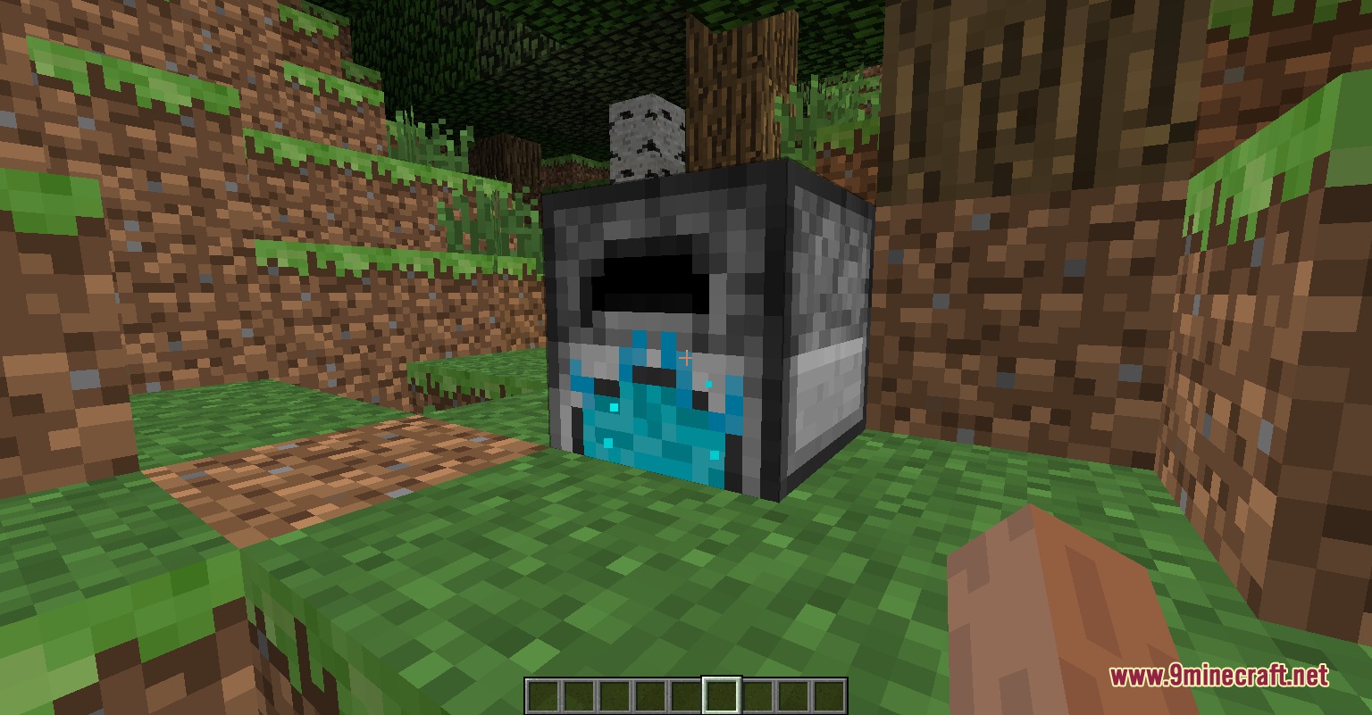 A Soul Extractor block with blue flames placed in a forest environment