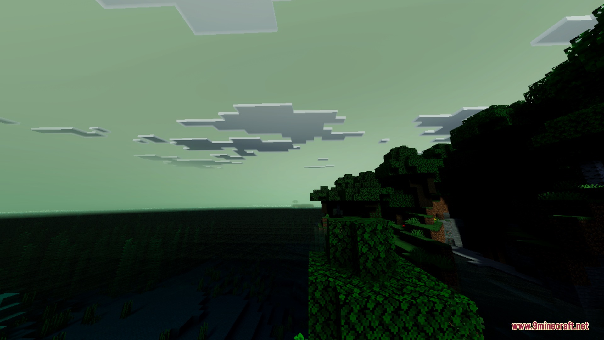 End Visual Dimension Shader Screenshot 1 A dense forest landscape under a mysterious and dark greenish grey sky