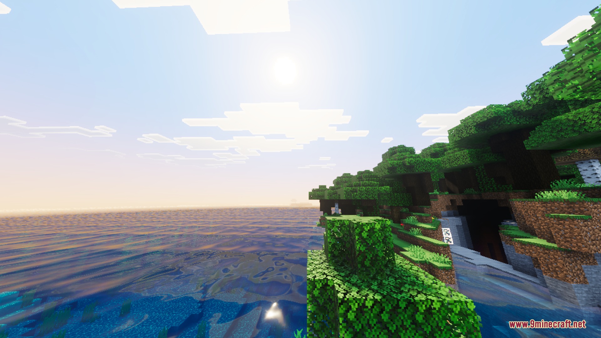 Ethereal Mystic Reworked Shader Screenshot 2 Lush green trees on a cliff overlooking the calm ocean under a bright sky