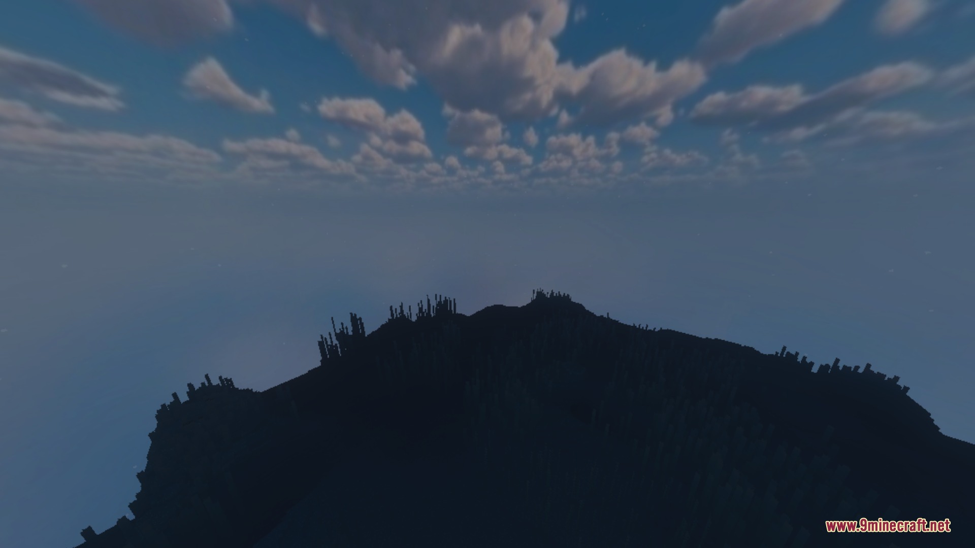 Evermist Shader Screenshot 3 Dark terrain silhouetted against a starry night sky with soft realistic clouds