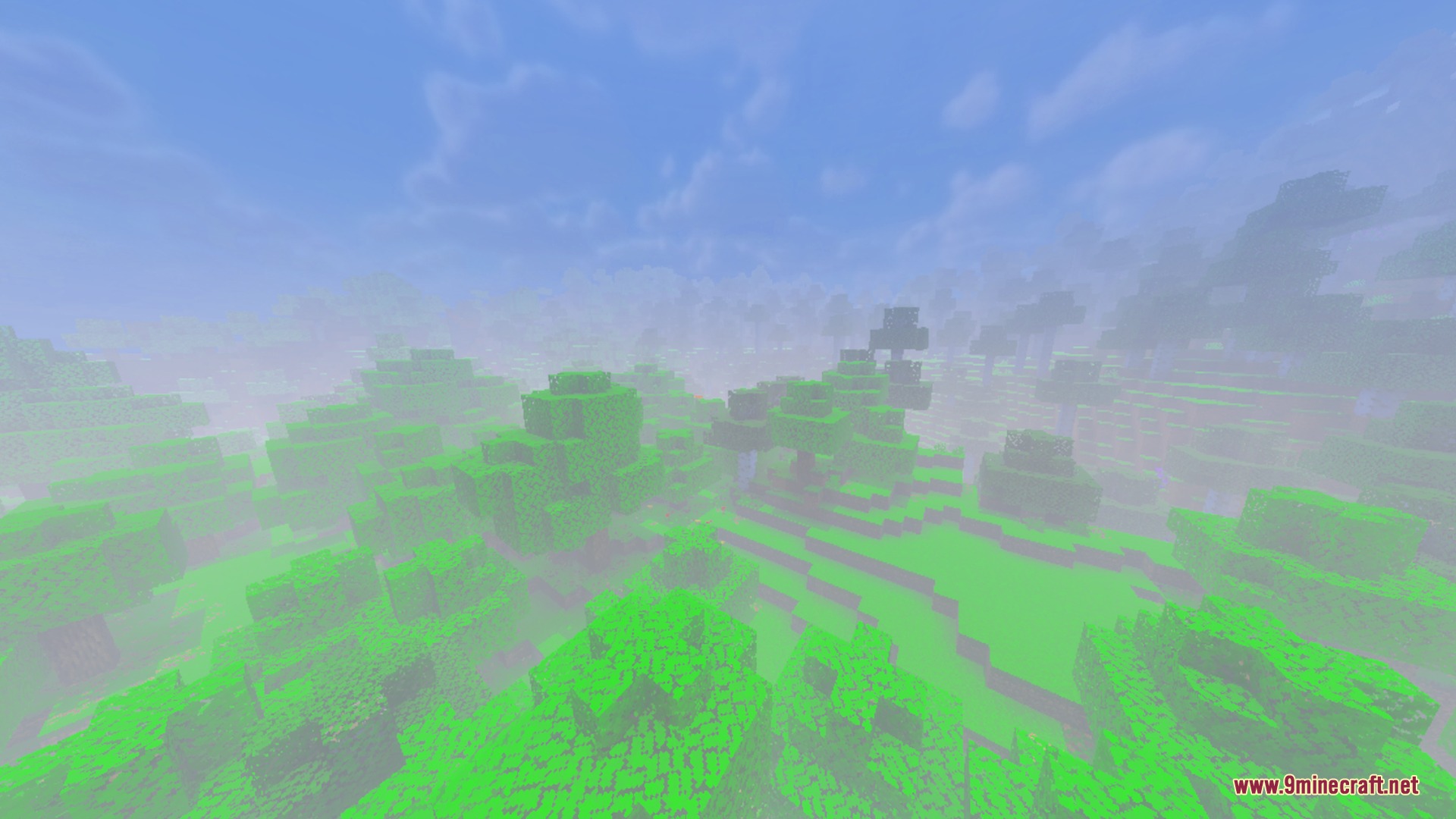Evermist Shader Screenshot 7 Lush green forest landscape with thick distance fog and a blue sky