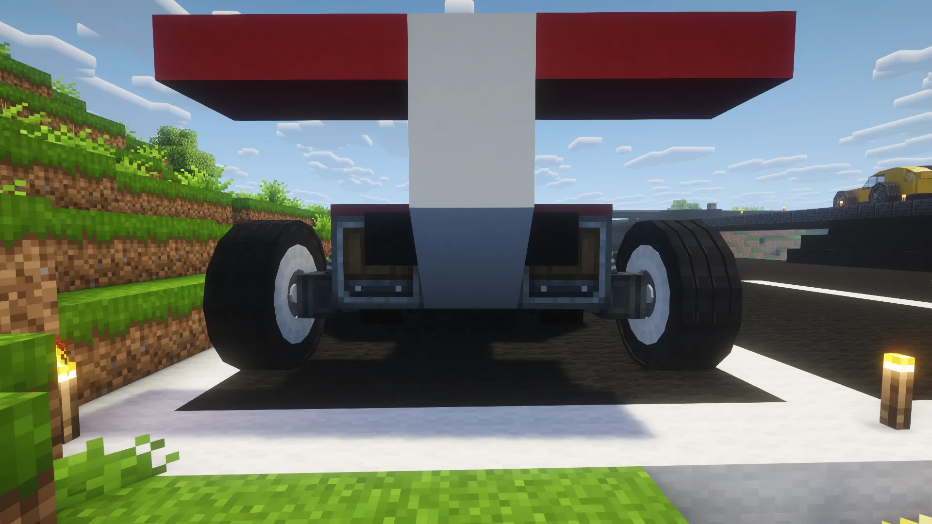 F1 Schematic Screenshots 2 Rear view of a red and white racing car with large black tires