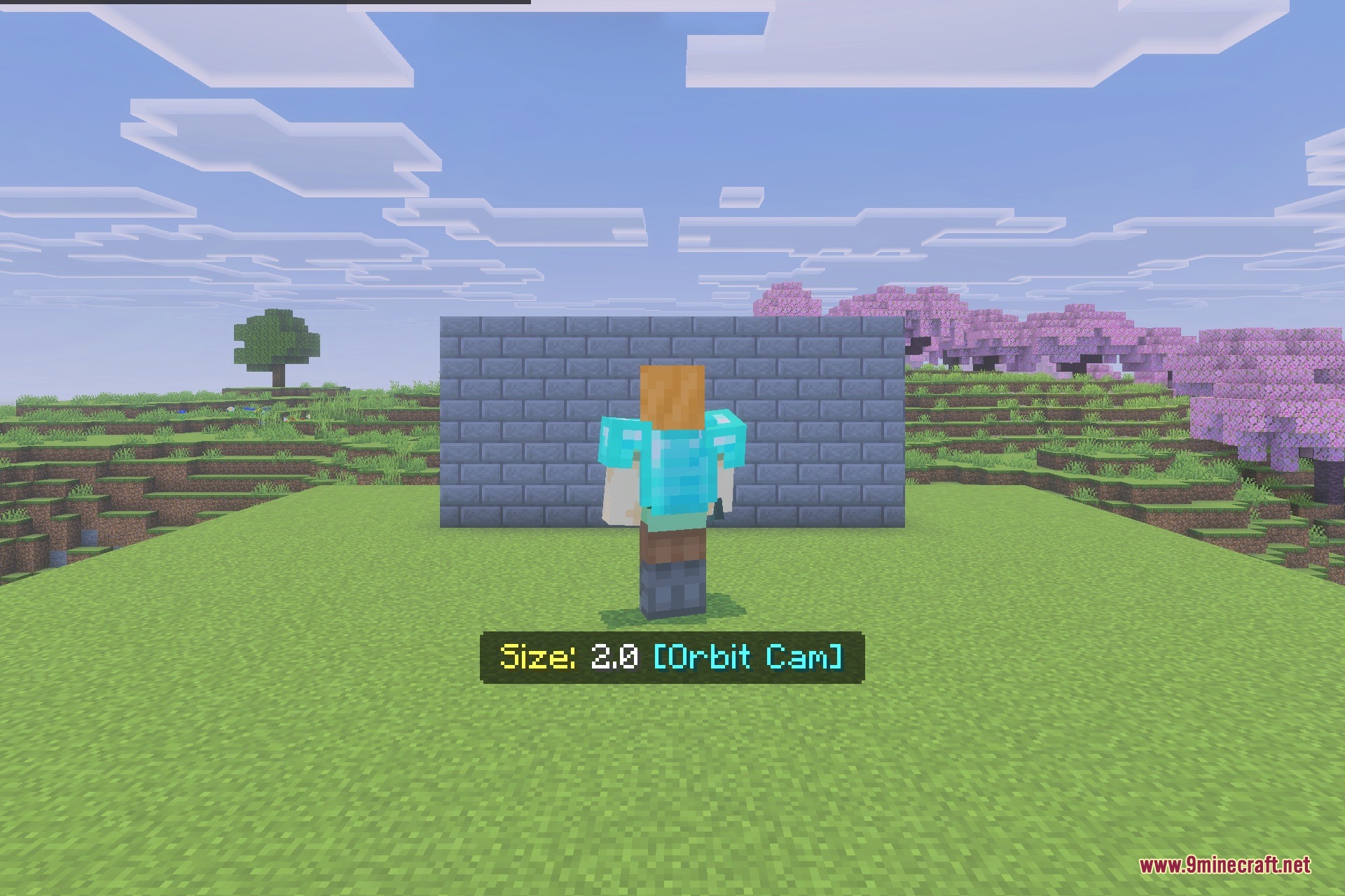 FIXED Player Resizer Addon Screenshot 3 An enlarged character in diamond armor standing near a stone brick wall structure