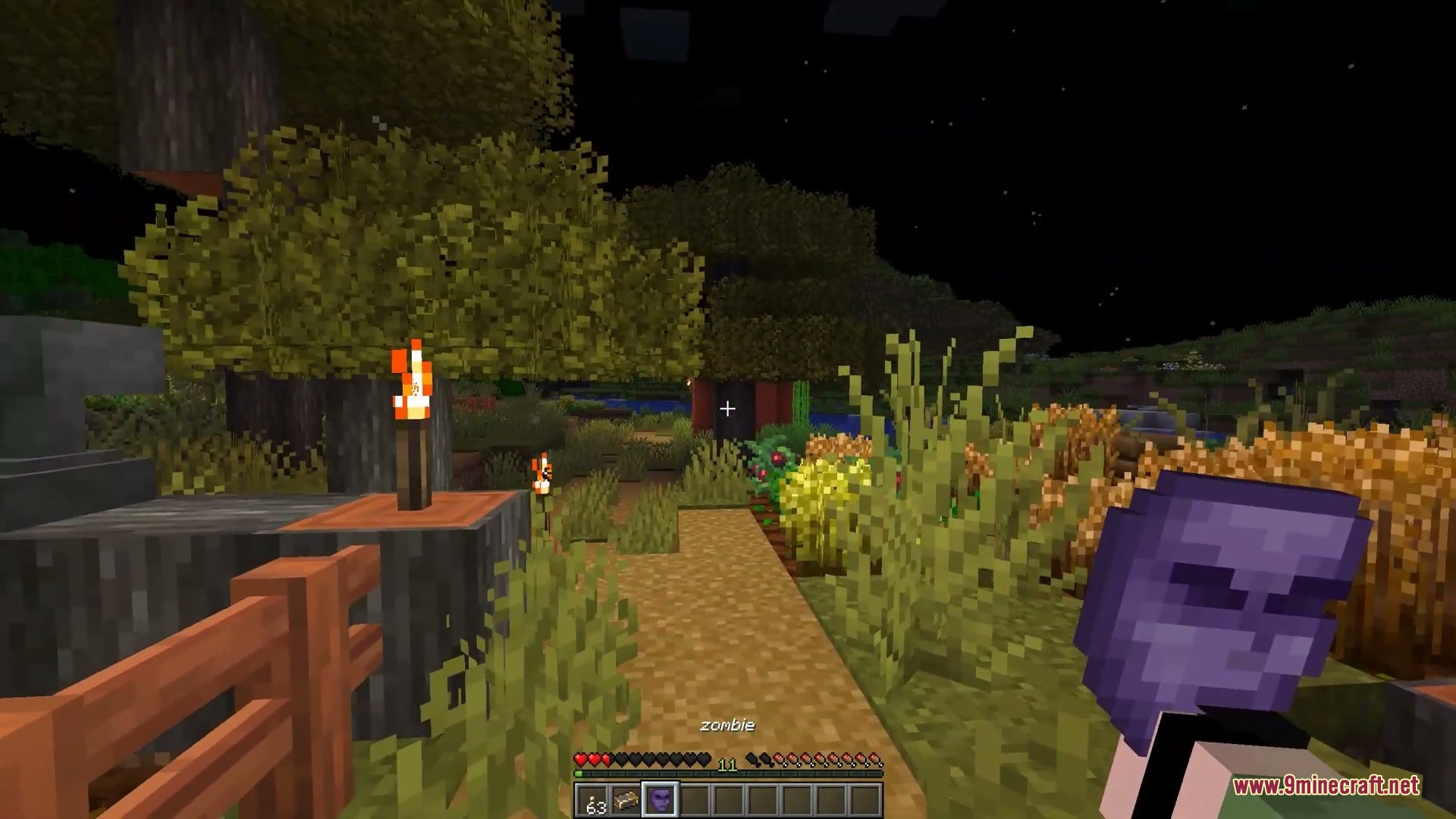 Faceless Persona Mod Screenshot 7 A player holds a purple disguise mask while looking at a distant zombie