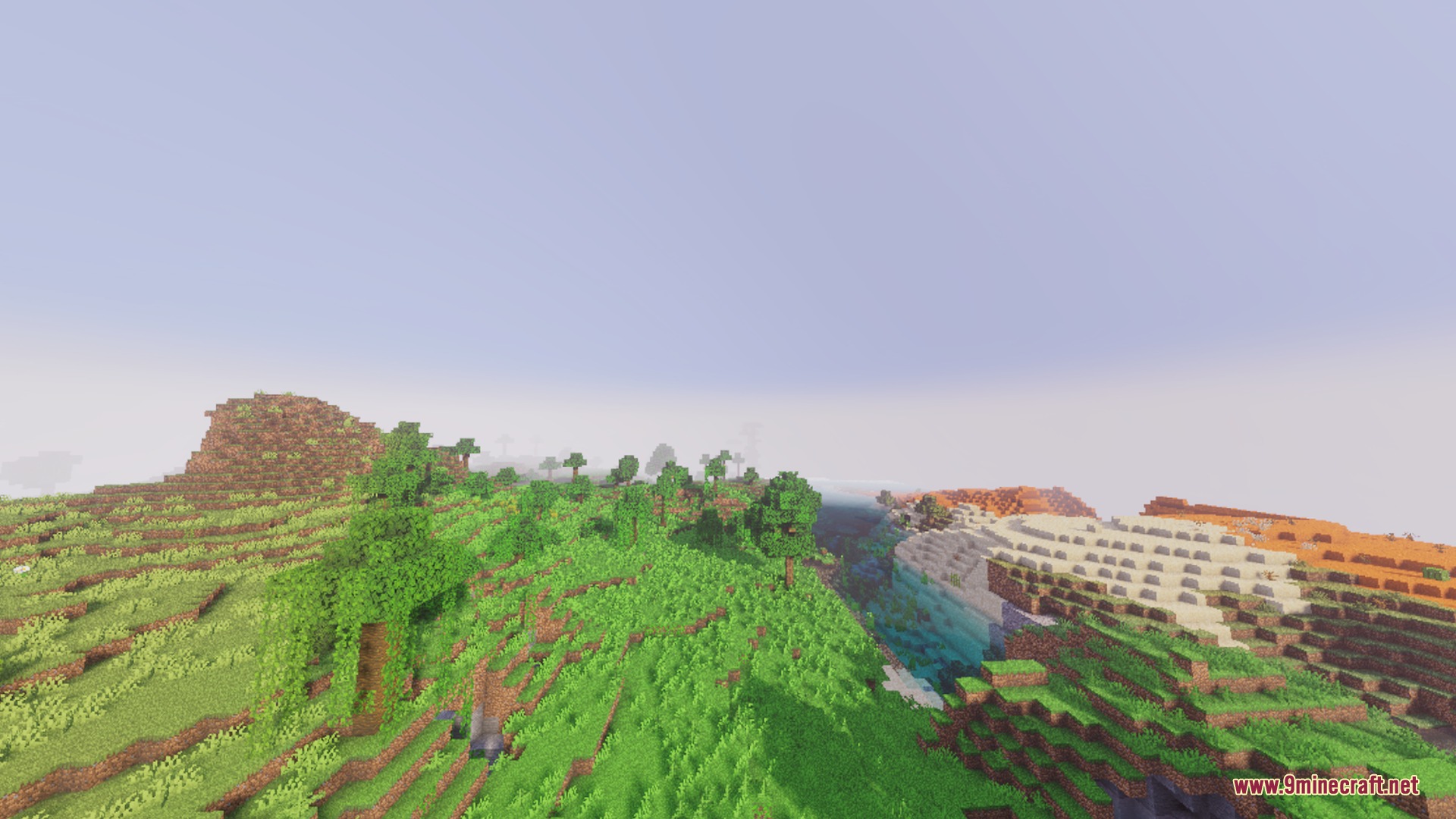 Flamingo Visuals Shader Screenshot 8 Bright daylight shines over lush green hills and a desert river valley