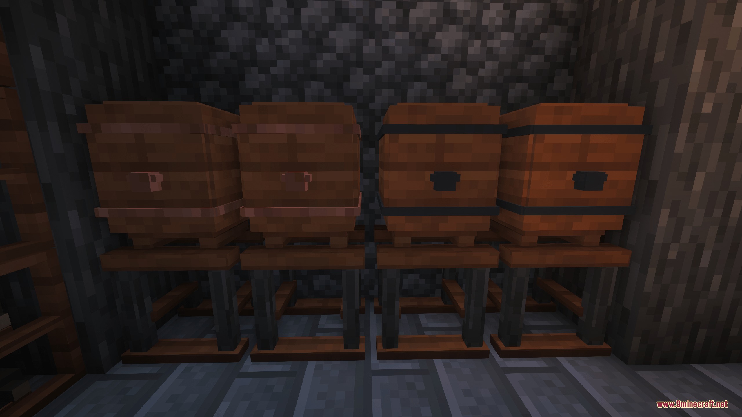 Gilded Grape Harvest Mod Screenshot 7 Four wooden aging barrels placed on stands inside a dark stone cellar