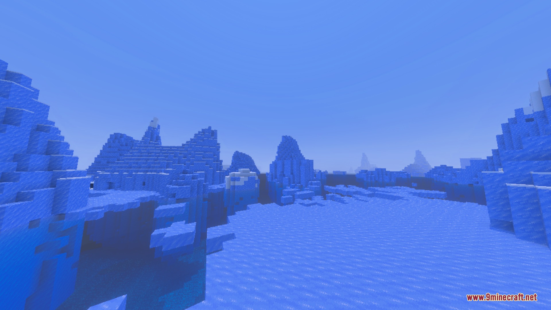 Massive blue icebergs and frozen water in a cold Minecraft ocean biome