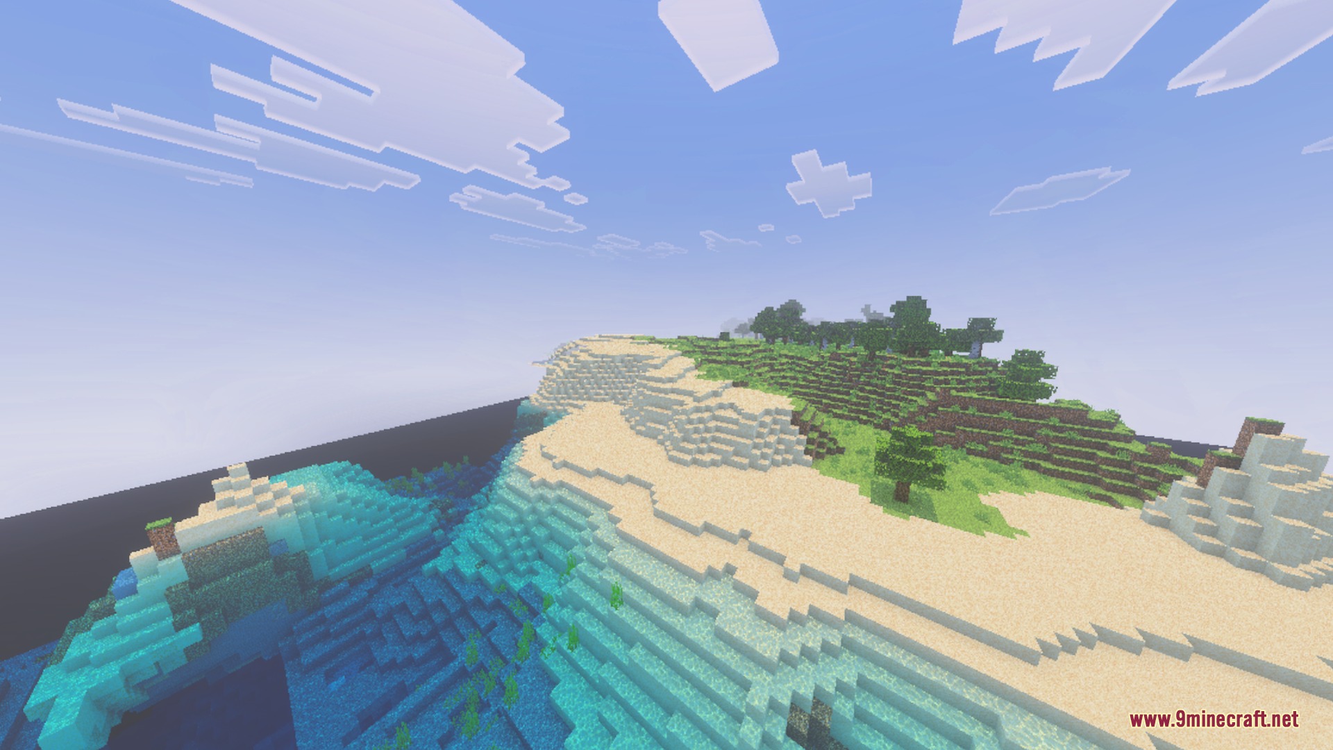 A scenic Minecraft coastline featuring a sandy beach next to a blue ocean