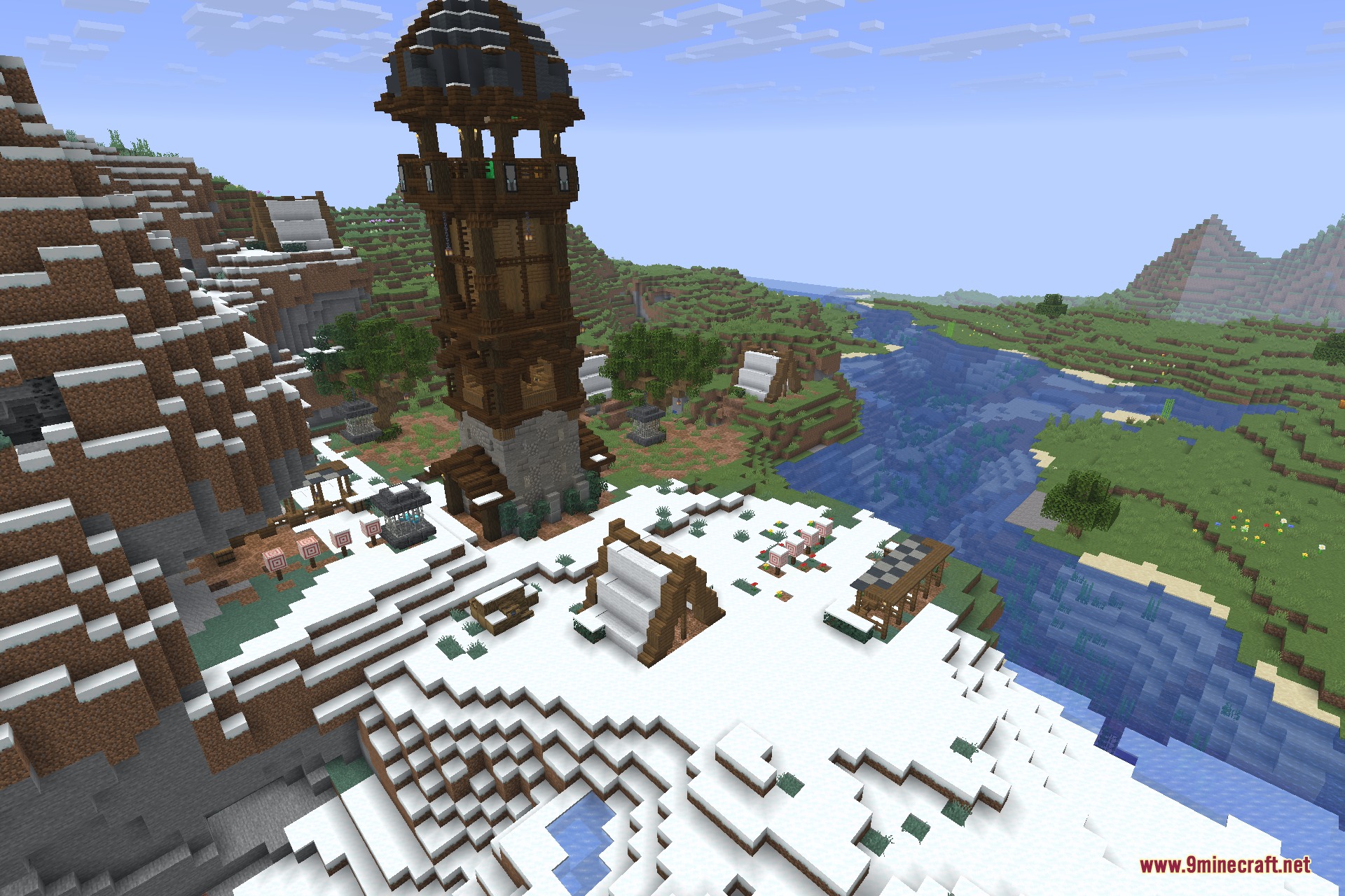 A tall pillager outpost tower standing on a snowy mountain peak