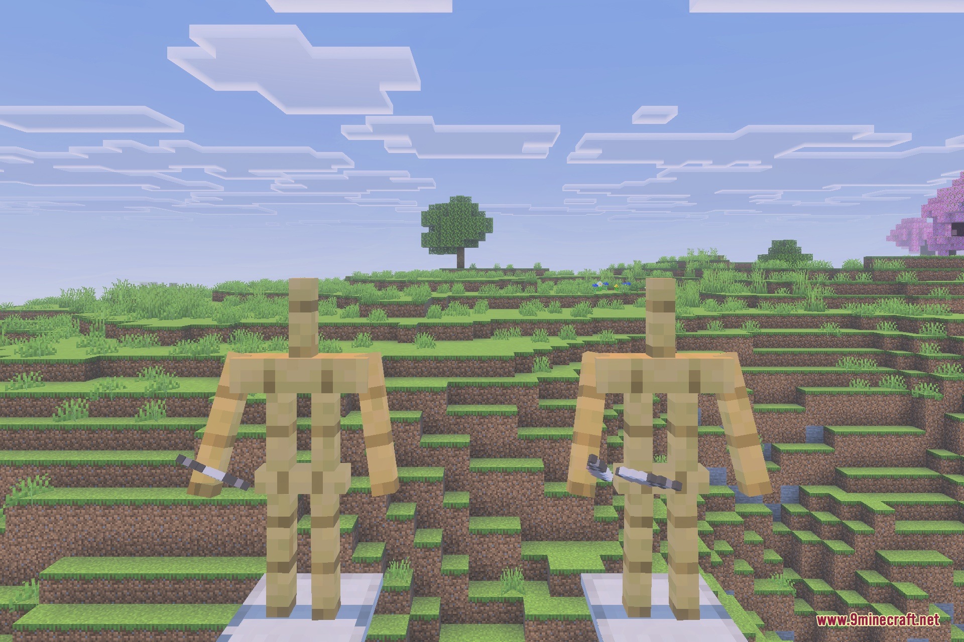 Two armor stands holding katanas in a vast green Minecraft landscape