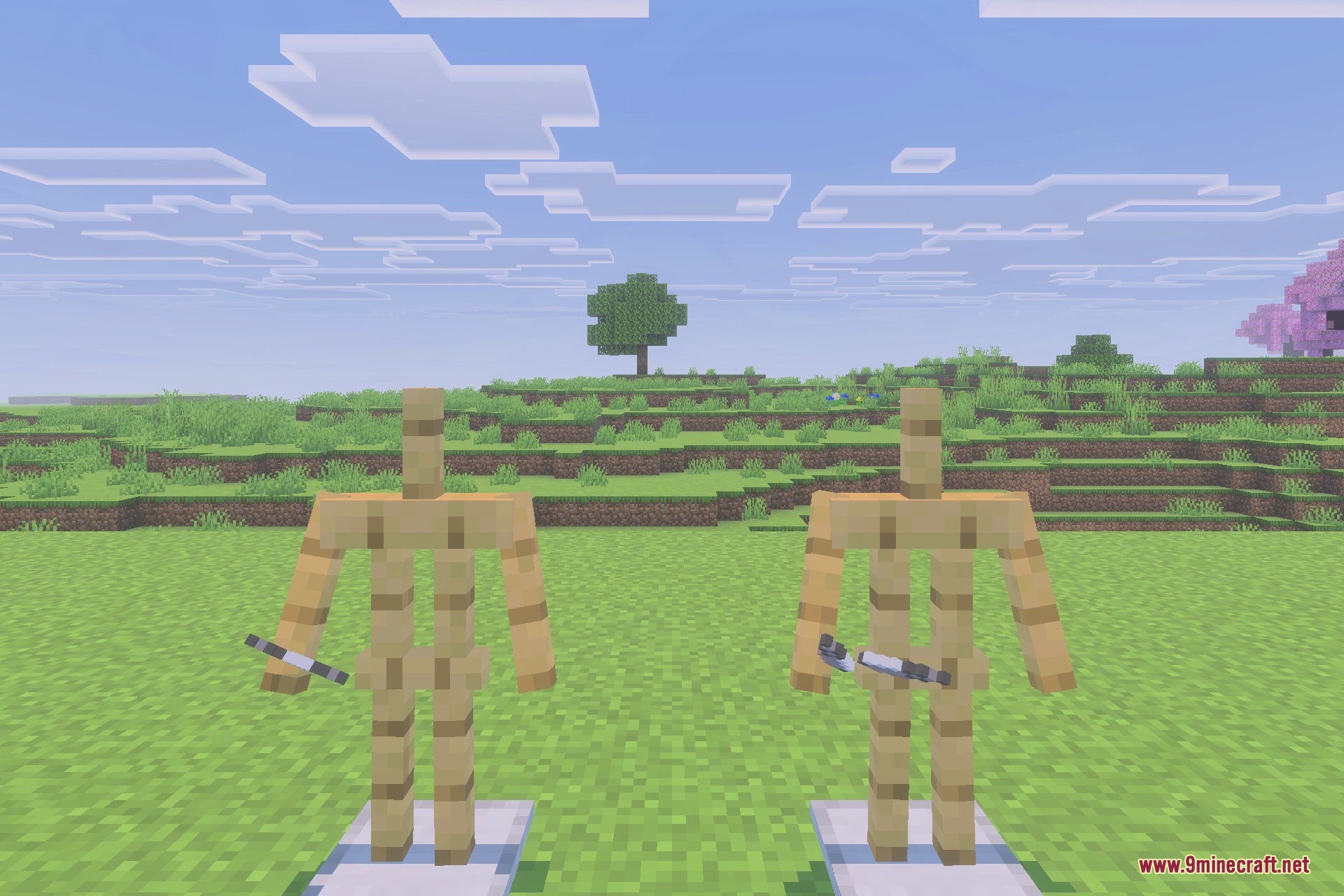 Armor stands showcasing the sharp blades from the Gun and Katana mod