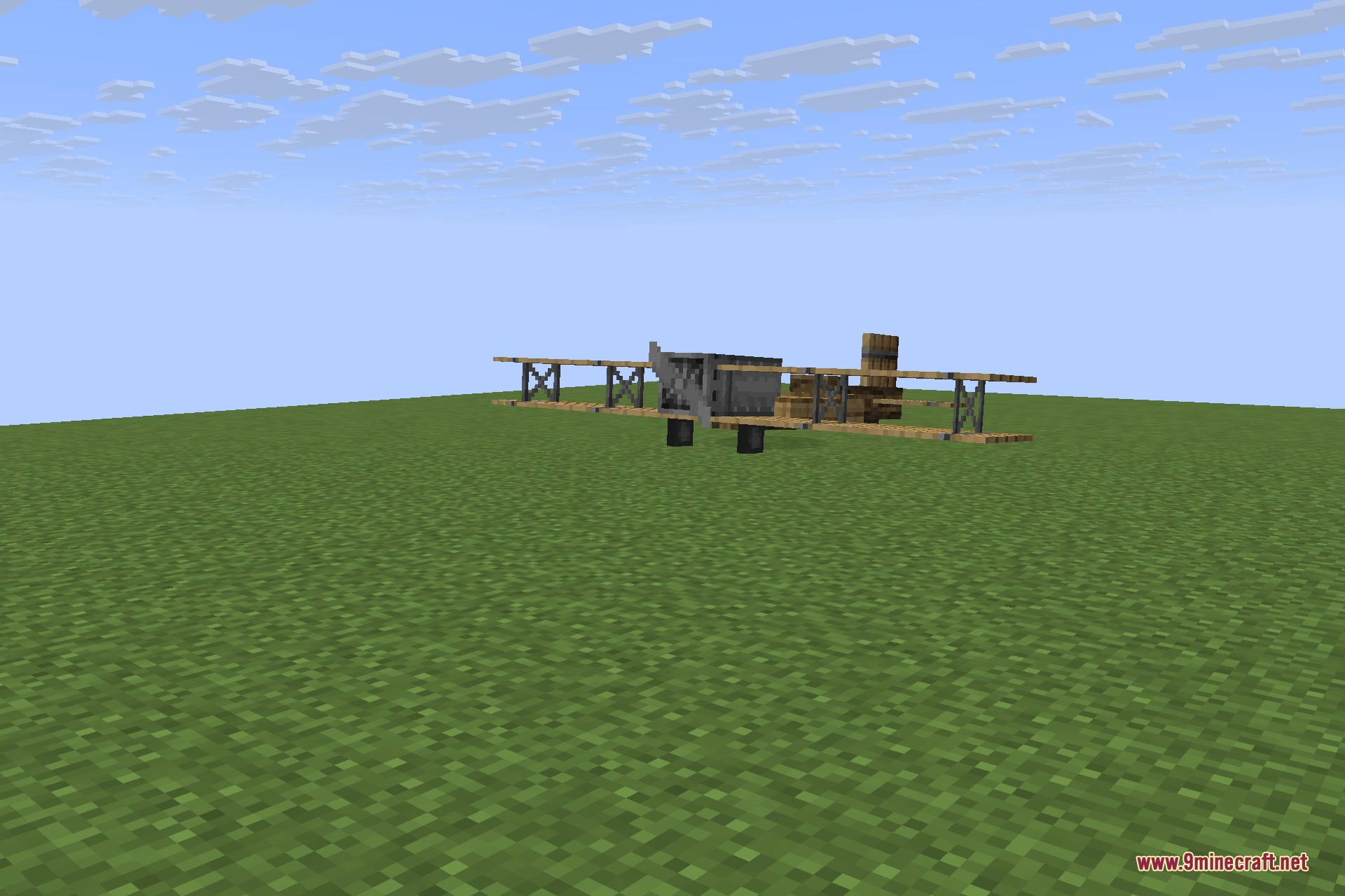 Immersive Aircraft 9minecraft Mod Screenshot 10 A hand built wooden biplane resting on a flat green field