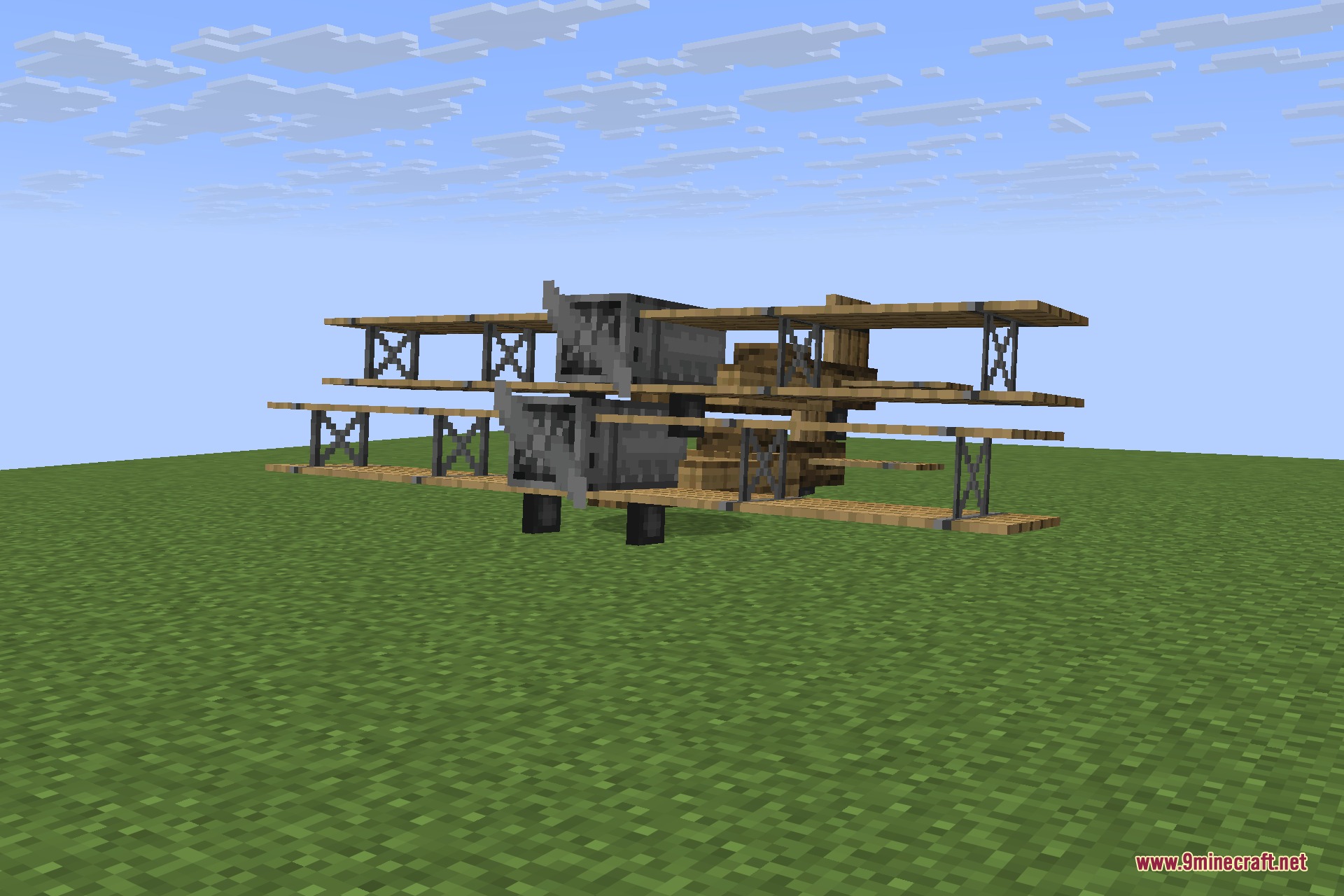Immersive Aircraft 9minecraft Mod Screenshot 2 A rustic biplane with multiple wings parked on a flat green field