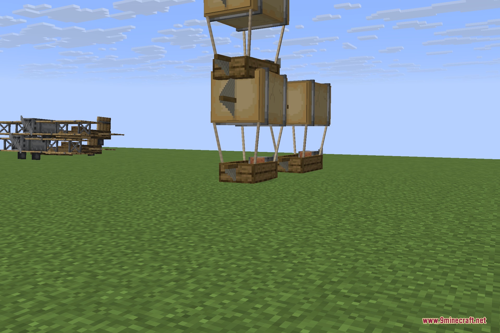 Immersive Aircraft 9minecraft Mod Screenshot 3 A cargo airship with multiple balloons and chests attached to the bottom