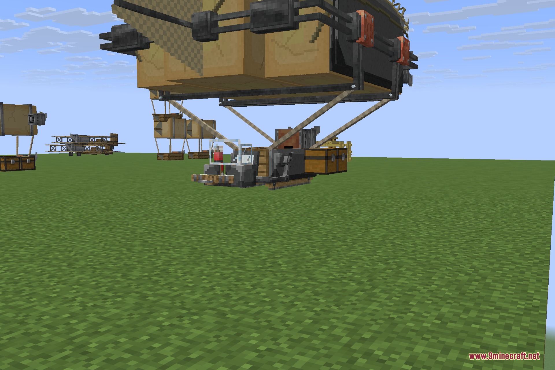 Immersive Aircraft 9minecraft Mod Screenshot 5 A large cargo airship with storage chests hovering over a flat grassy field