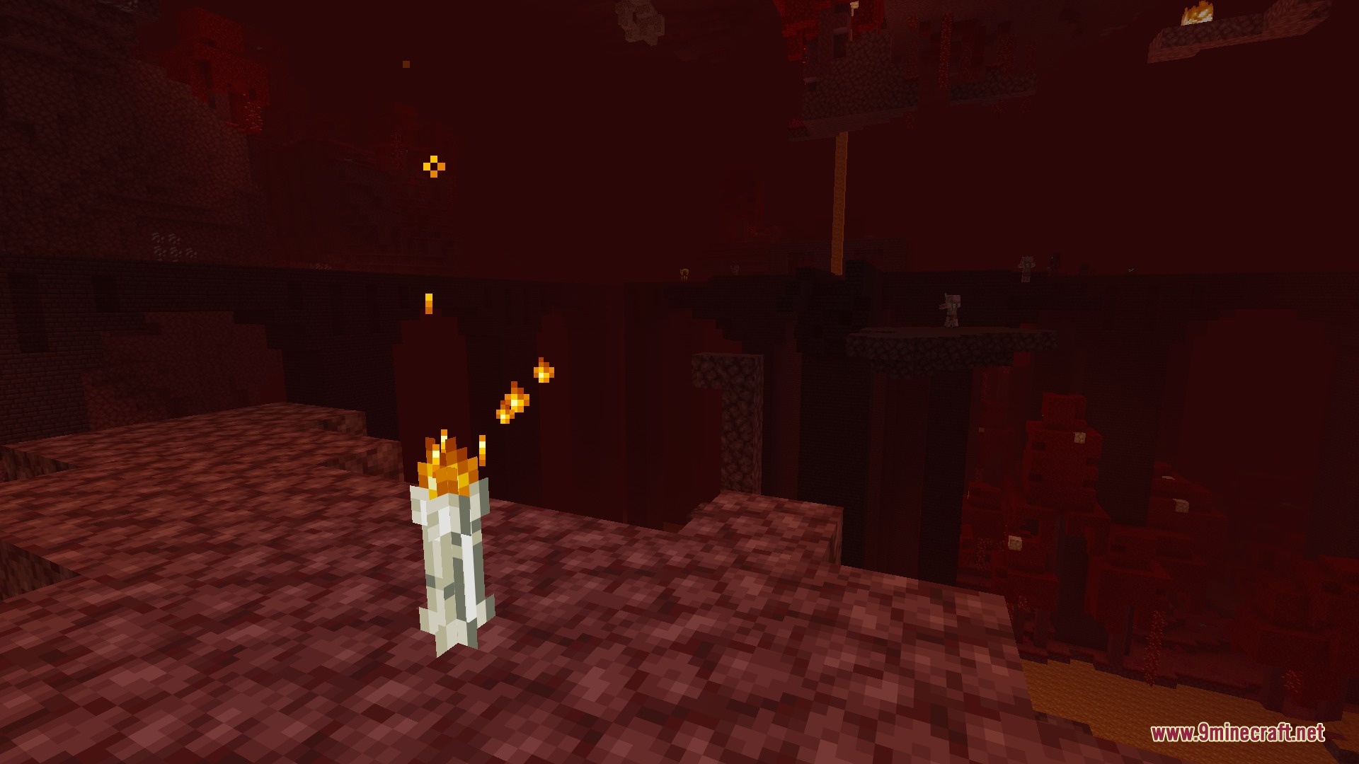 Infernal Curiosities Mod Screenshot 8 A blaze torch placed on netherrack emitting particles pointing toward a fortress