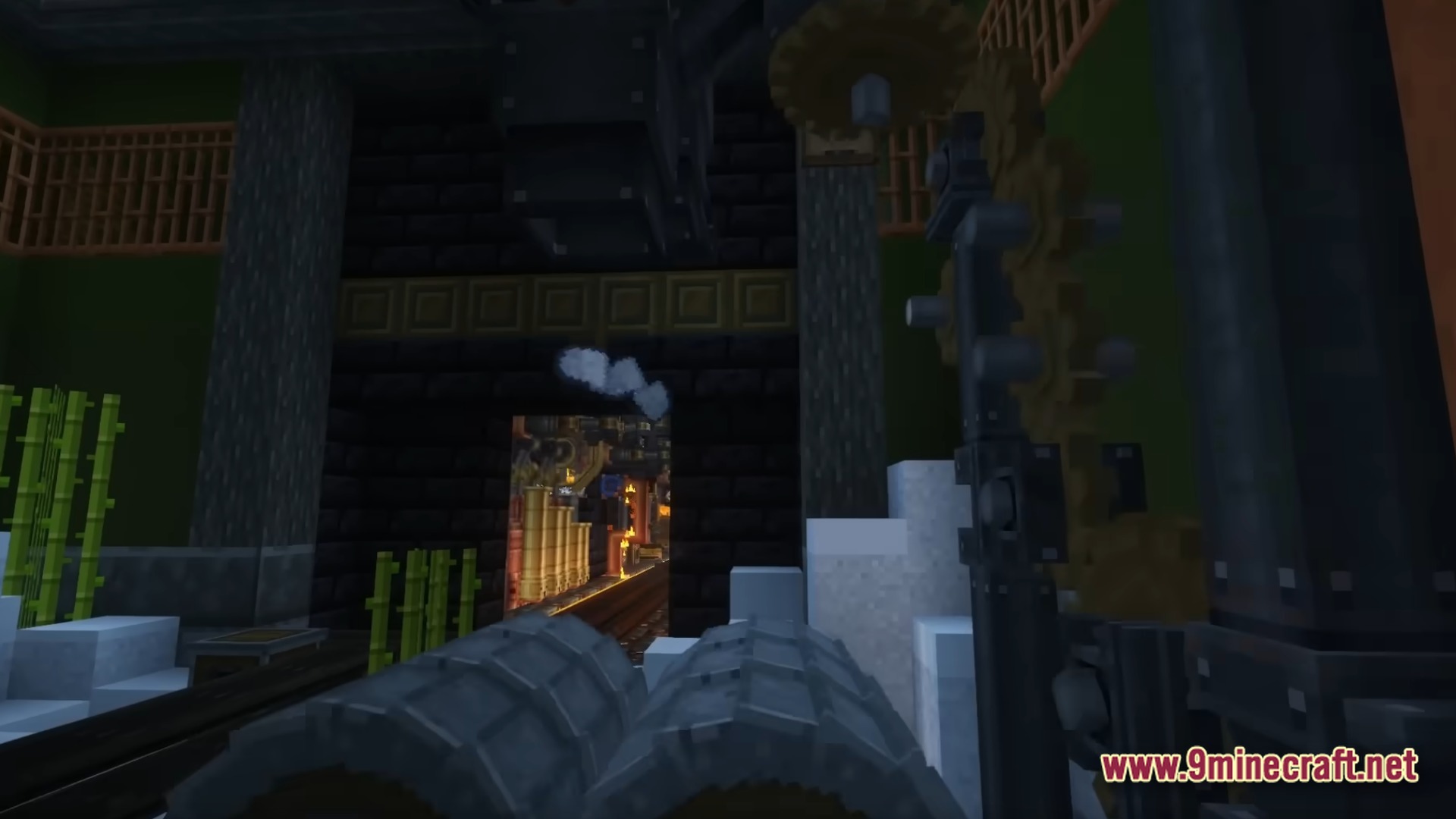 Infernal Kinetic Dread Modpack Screenshot 9 Large industrial machinery and rotating gears positioned near a dark stone entrance with bamboo plants