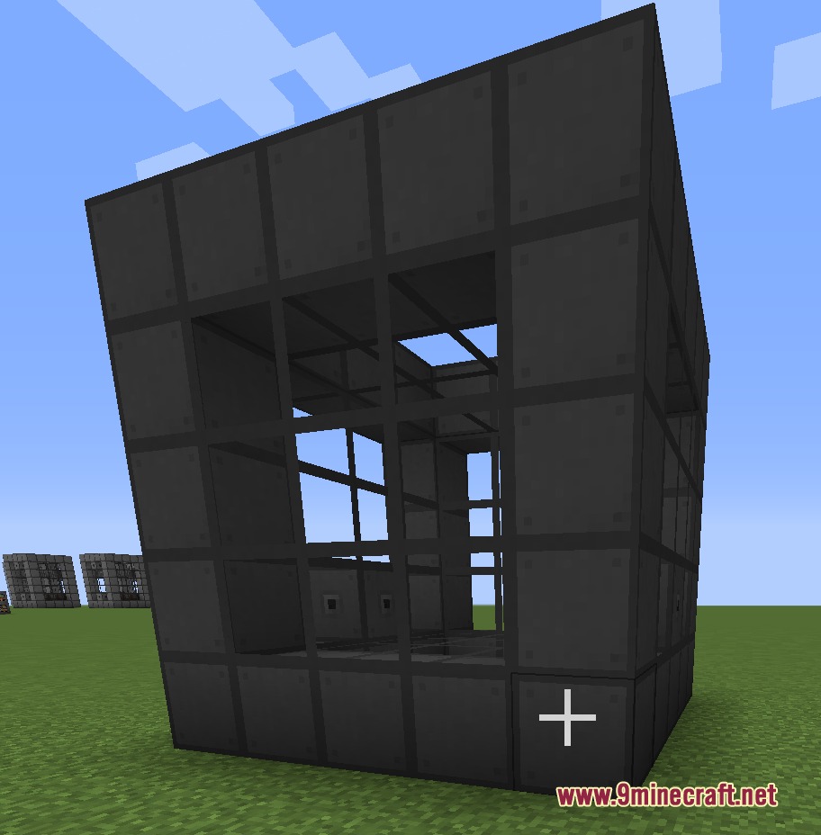 Instant Structure Snap Mod Screenshot 4 A large dark gray multiblock structure with glass windows standing on a field