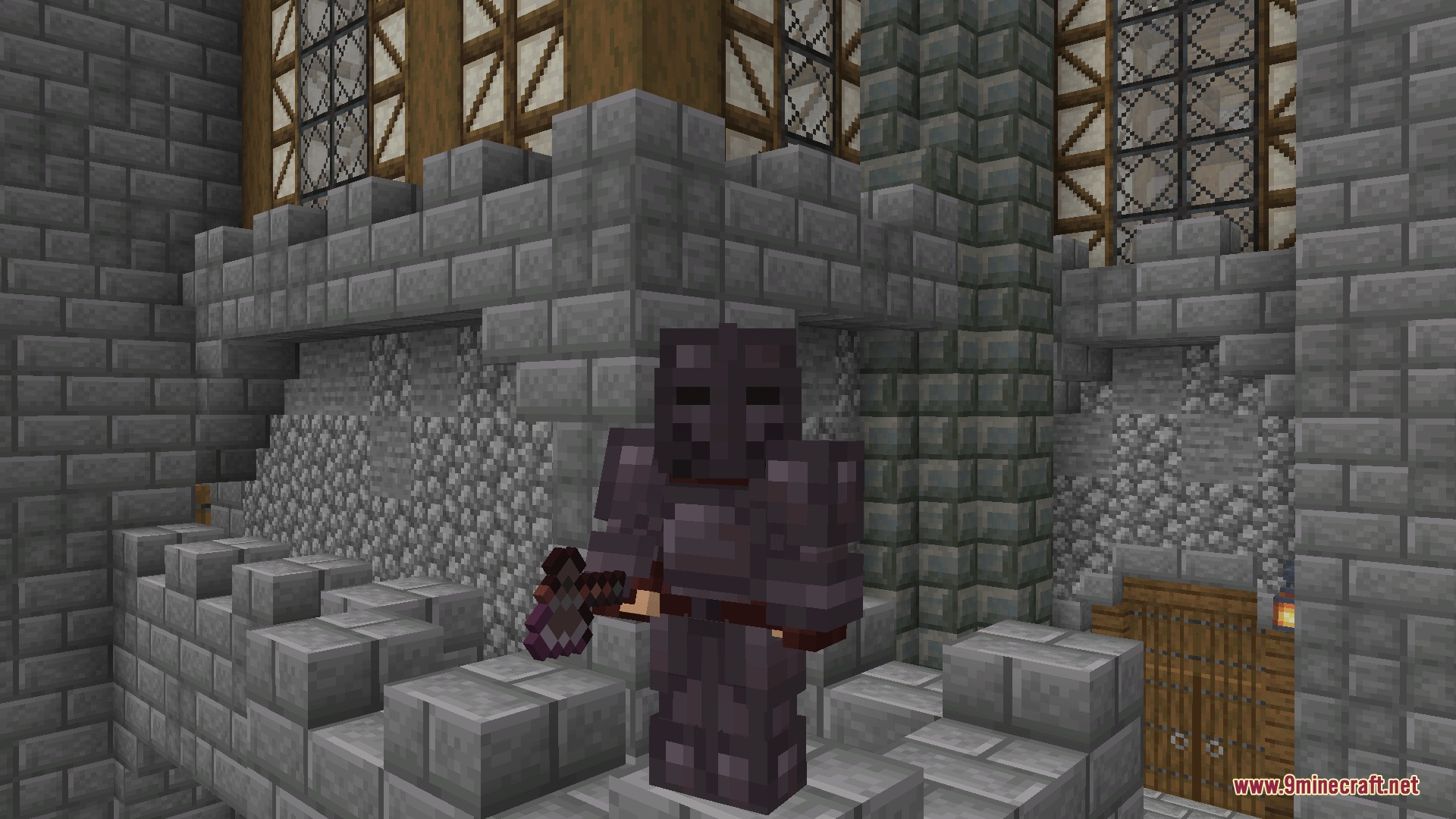 A player in netherite plate armor holding an axe inside a stone castle