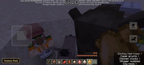 villager near a dark block structure on a sandy ground, night
