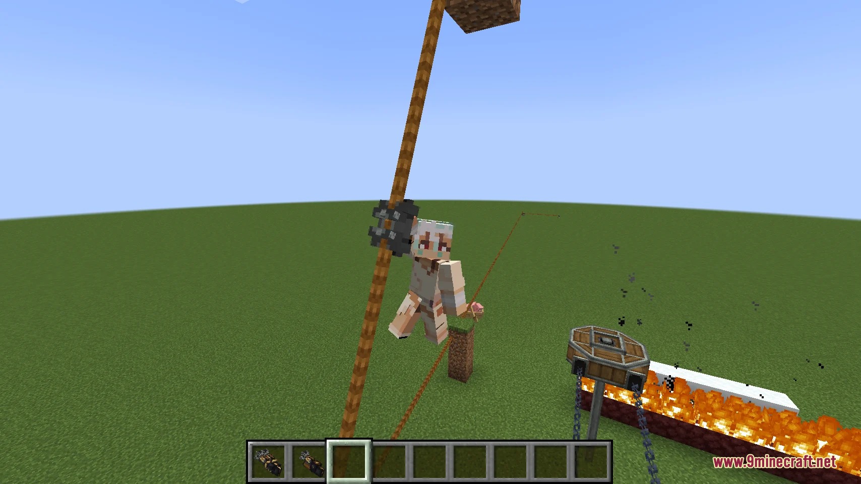 Kinetic Avatar Sync Mod Screenshot 2 A character uses a skyhook to slide down a rope near mechanical blocks