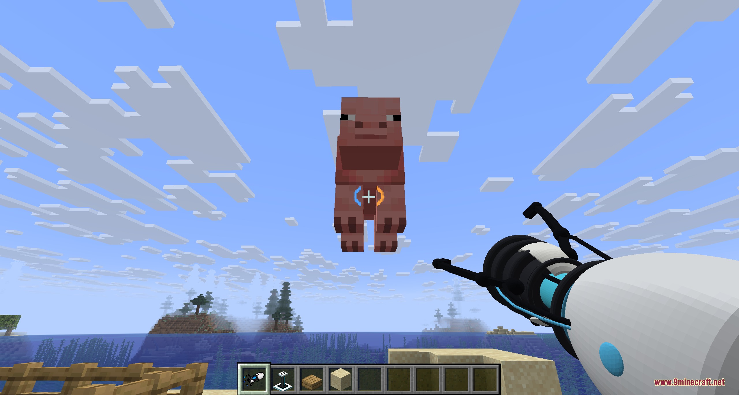 A player uses the portal gun to lift a pig into the sky