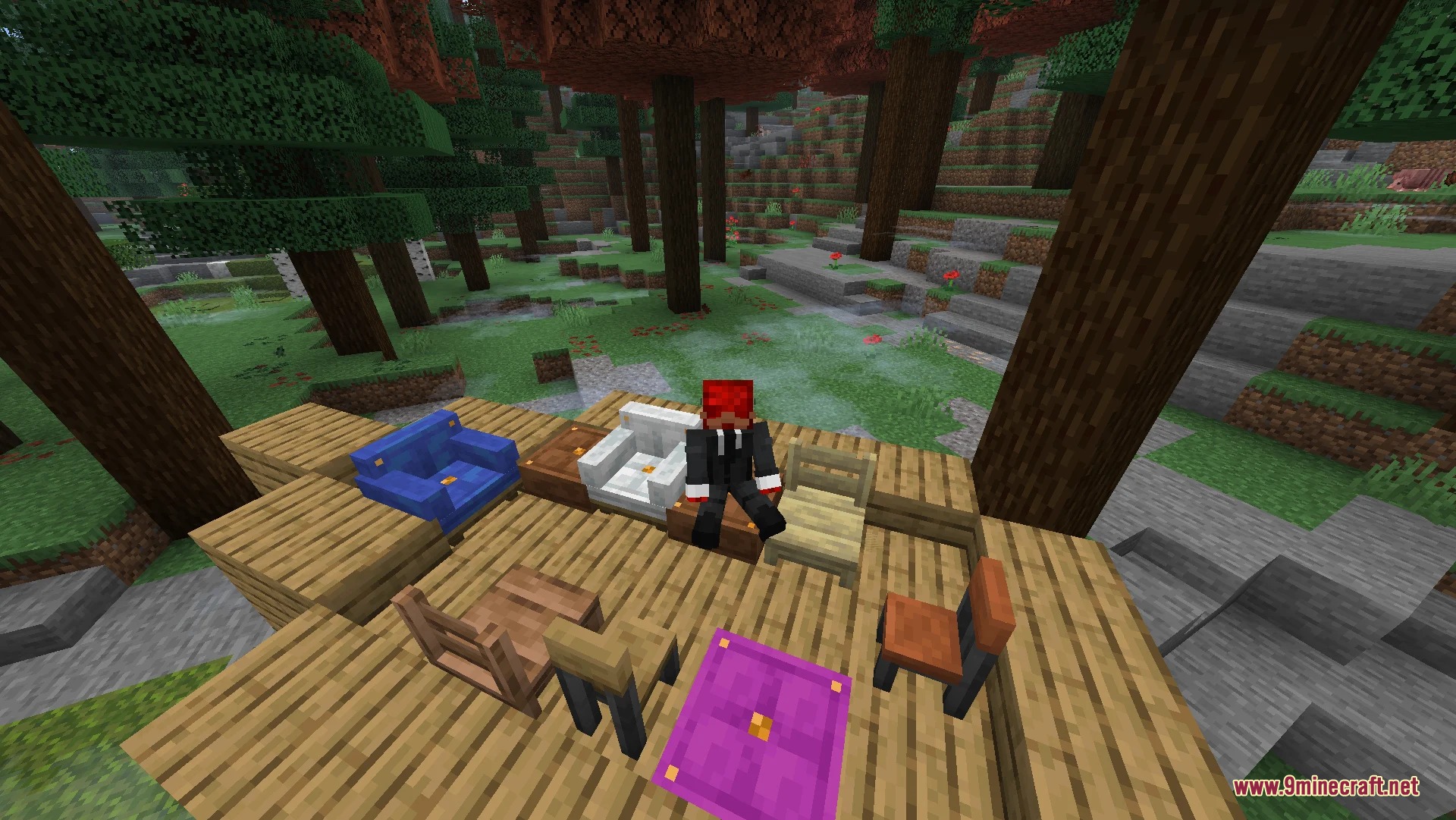 A player sitting on a white chair surrounded by various furniture pieces