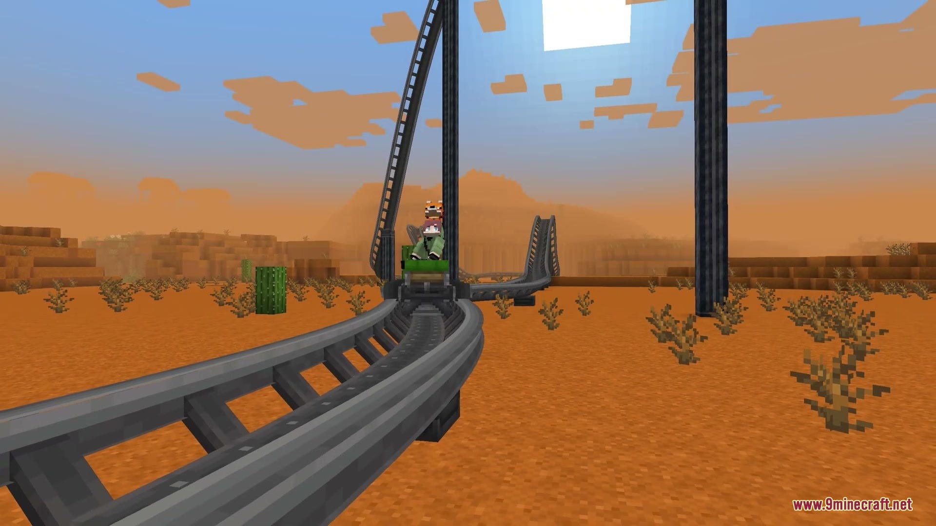 Kinetic Rail Rush Mod Screenshot 10 Riding a roller coaster cart through a desert biome with tall supports