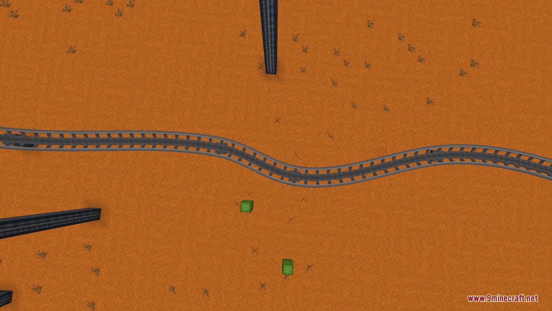 Kinetic Rail Rush Mod Screenshot 11 Top down view of winding roller coaster tracks on a red sand landscape