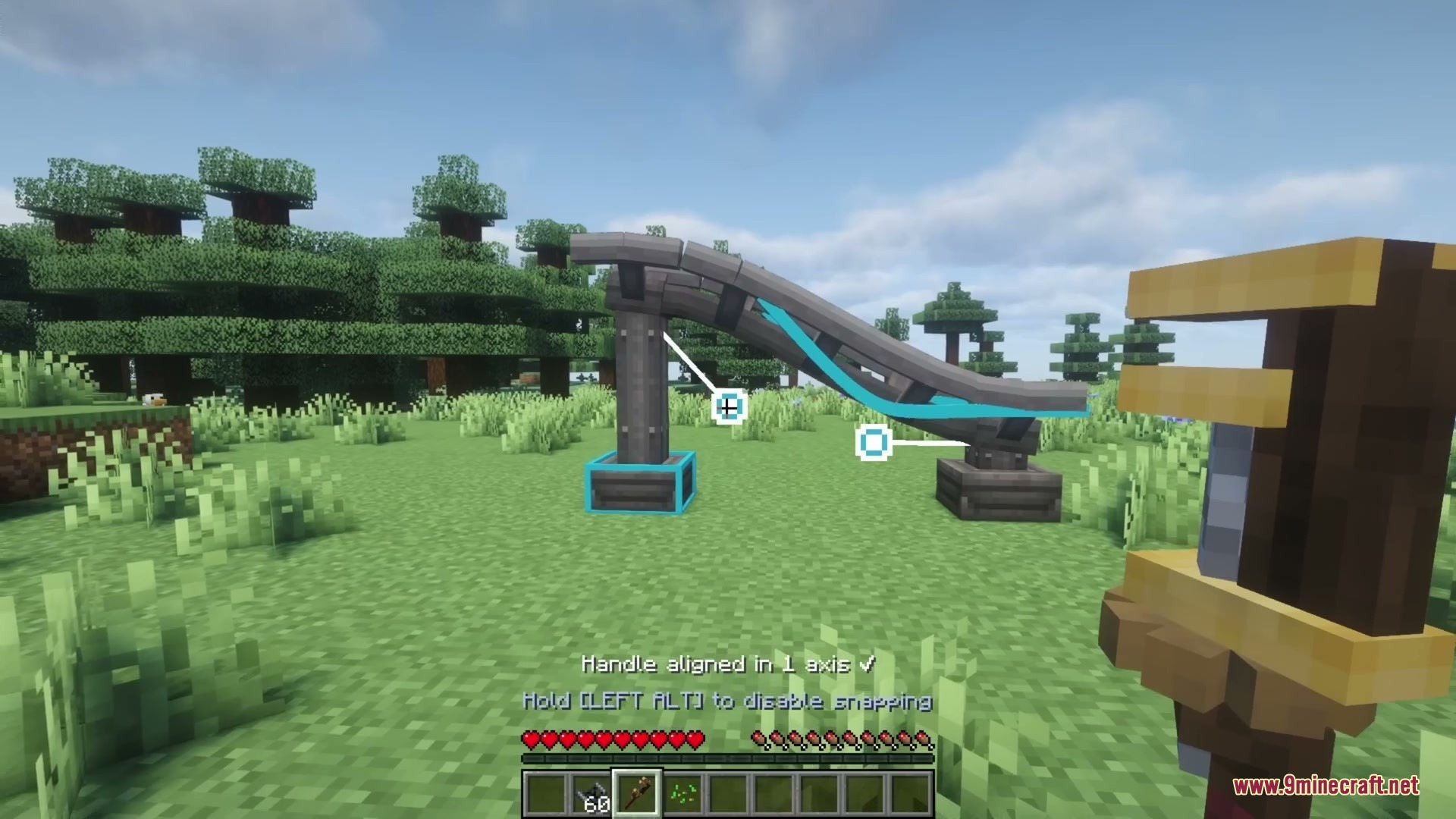 Kinetic Rail Rush Mod Screenshot 6 The player shapes a curved roller coaster track using the wrench tool handles