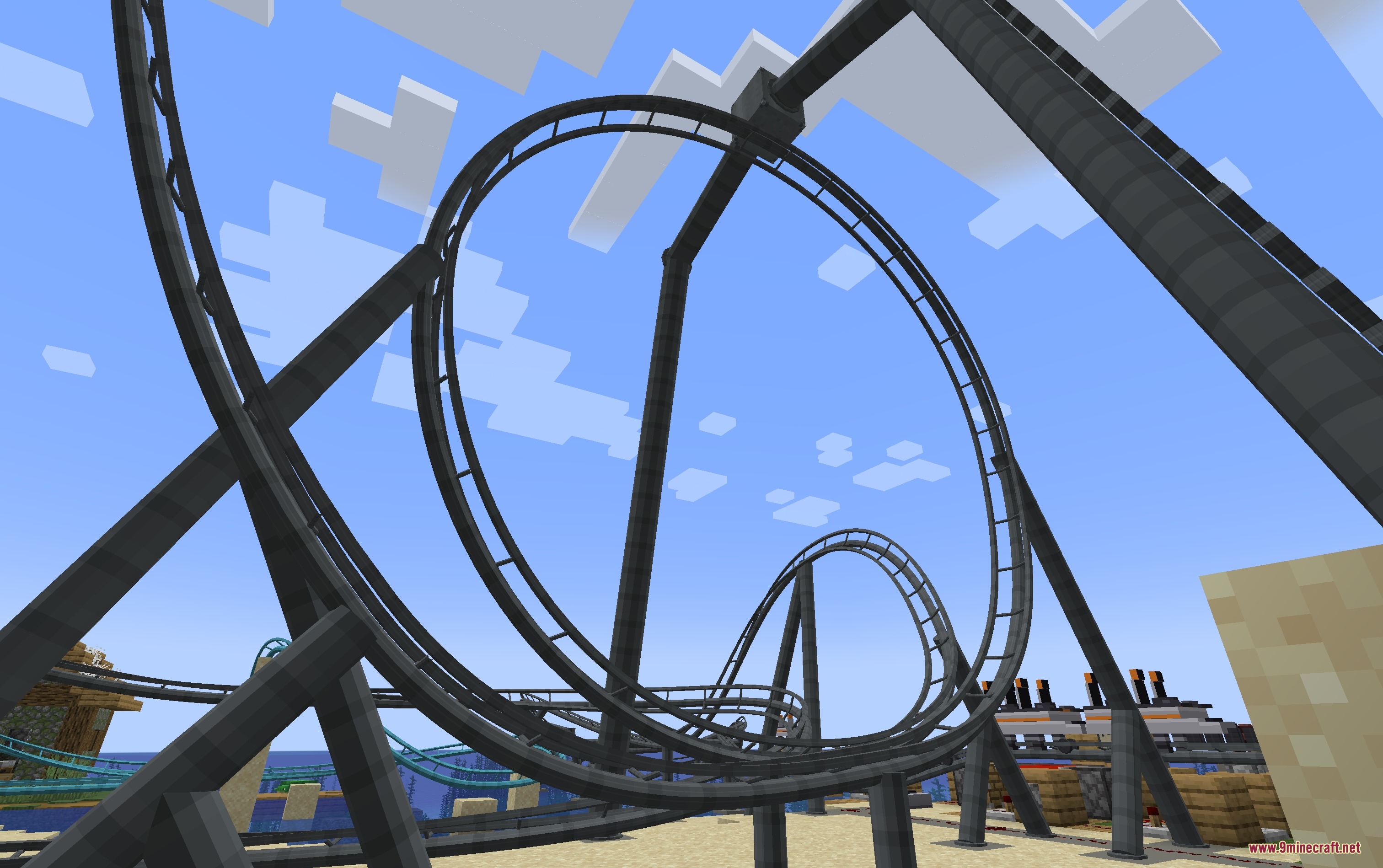 Kinetic Rail Systems Mod Screenshot 5 Detailed black steel roller coaster tracks forming a massive loop in Minecraft