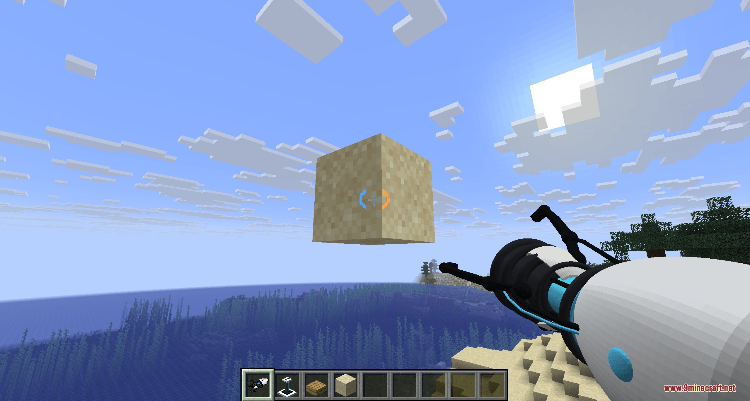 Kinetic Warp Gate Mod Screenshot 3 A player uses a portal gun to lift a floating sand block