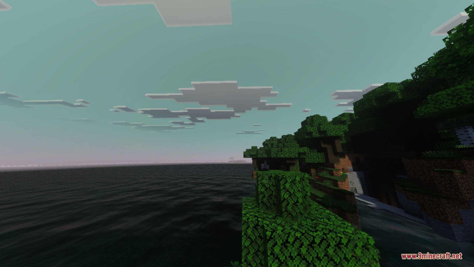 Luminara Visual Shader Screenshot 2 A scenic coastal view of a Minecraft forest next to the ocean