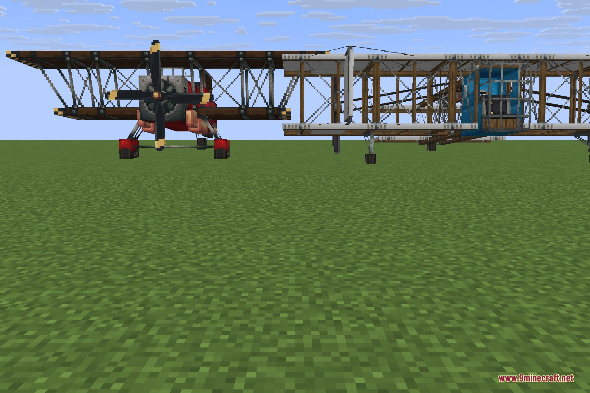 Man of Many Planes 9minecraft Mod Screenshot 6 Red racing biplane and wooden airliner standing together on the green grass