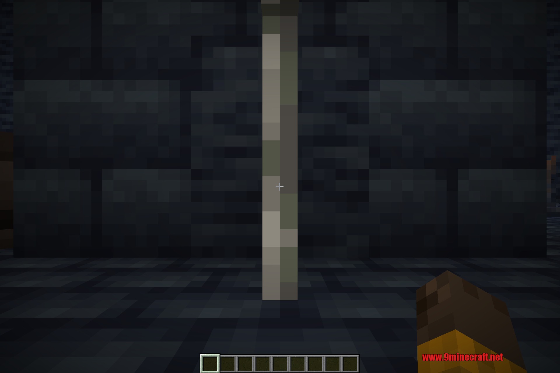 Inside the Prison, lit only by the torches set into its walls