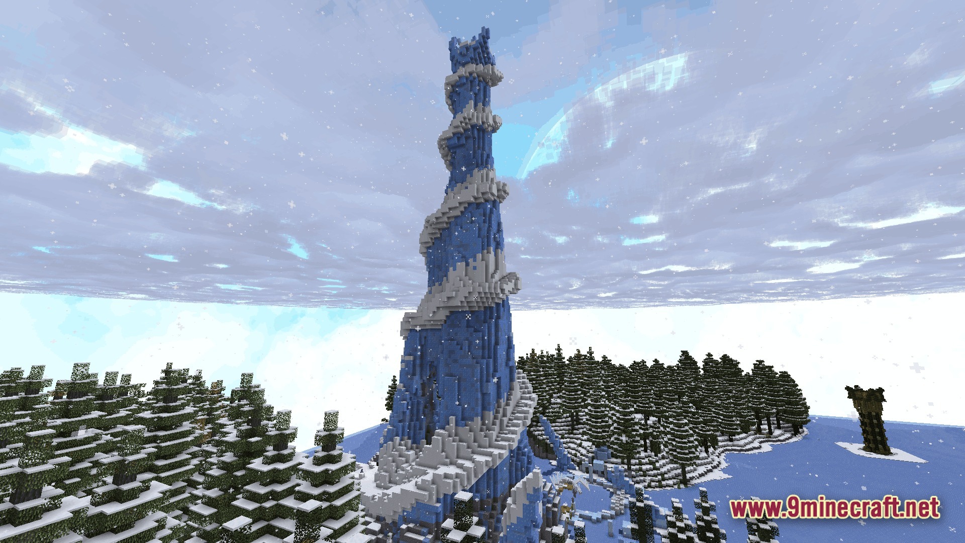 A tall blue and white spiral tower stands within a snowy coniferous forest biome during snowfall