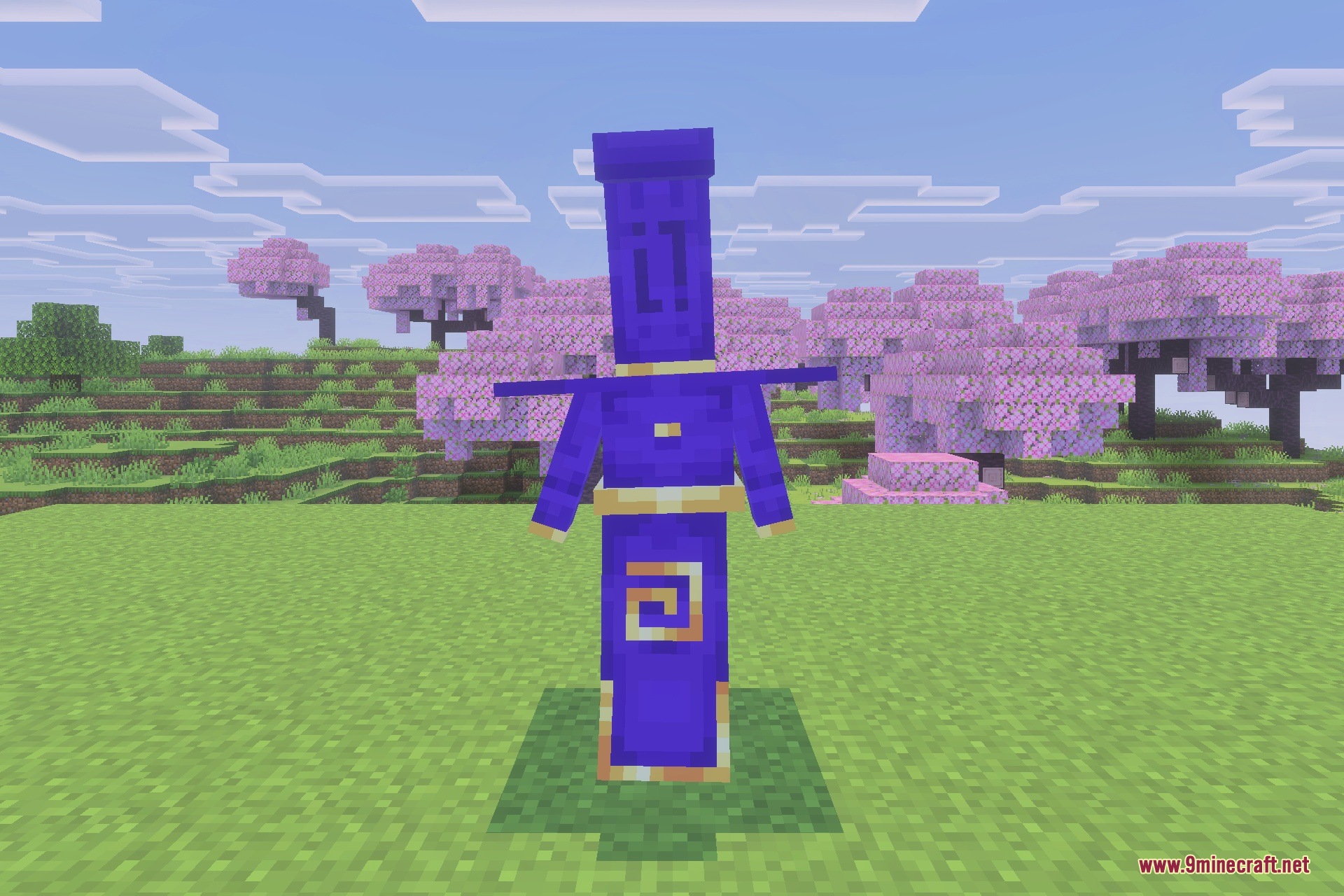 A decorative purple totem with golden runes stands in a cherry blossom biome