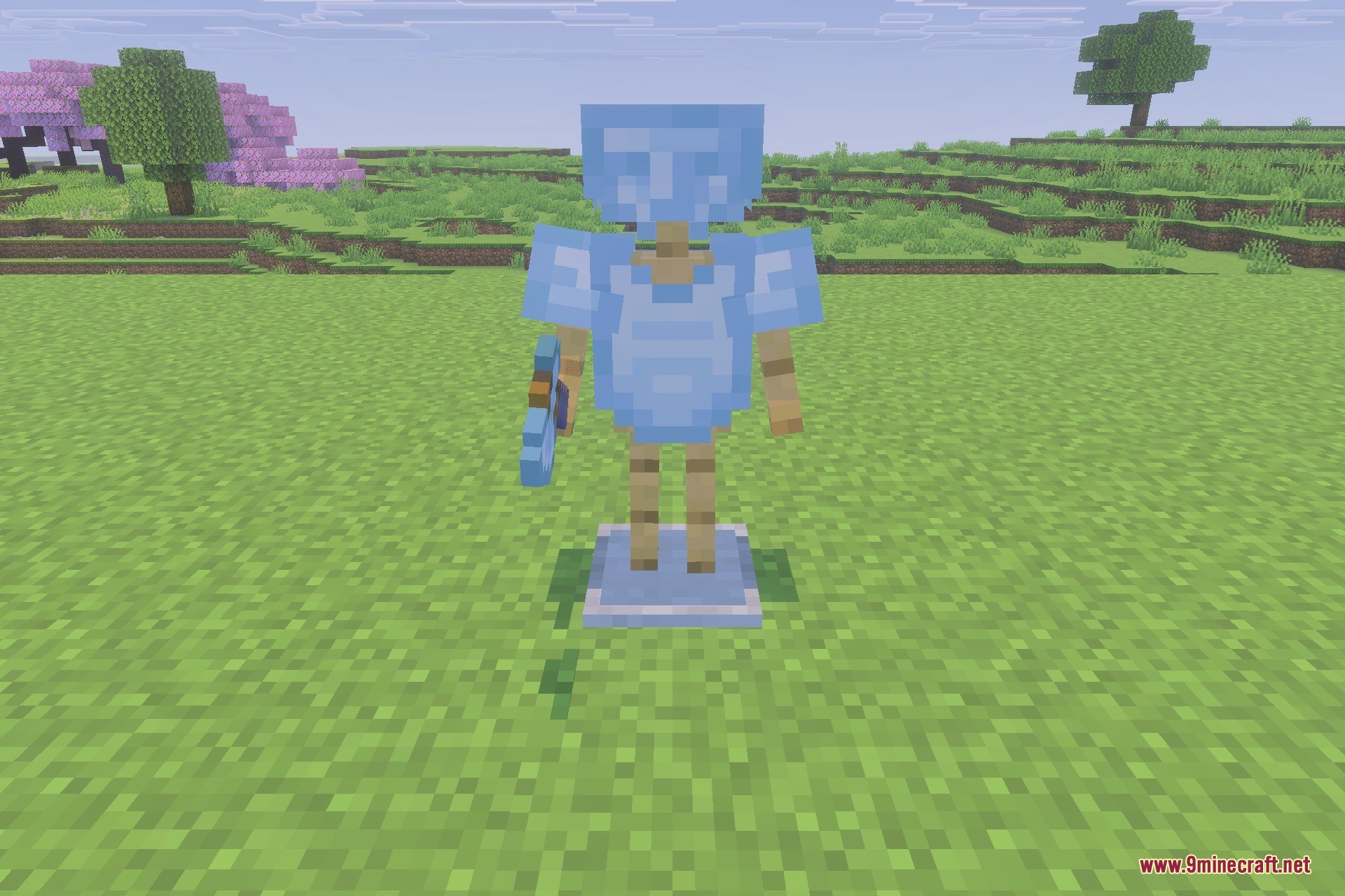 A set of light blue magical armor displayed on an armor stand